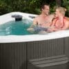 LS300_Plus-Arctic_White-Coastal_Gray-Lifestyle-Sideview-Closeup-Couple